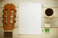 Inspirational background with a Spanish classical guitar on a wooden table