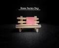 inspirational celebration day of rosa parks day with seat and blank red paper in vintage background