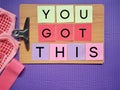 Inspirational Fitness Concept Quote - You got this. Text on notepaper with fitness equipment background. Royalty Free Stock Photo