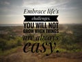 Inspirational life quote on blurry nature background.