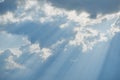 Inspirational light shining through clouds. The sun rays break through the clouds Royalty Free Stock Photo