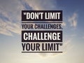 Inspirational motivating quote on nature background. Don't limit your challenges, challenge your limit.