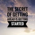 Inspirational motivating quote on nature background. The secret of getting ahead is getting started.