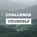 Inspirational motivation quote CHALLENGE YOURSELF with mountains background. Motivational quote.