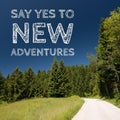 Inspirational motivation quote on natural landscape background, say yes to new adventures.