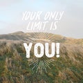 Inspirational motivation quote YOUR ONLY LIMIT IS YOU on nature background. Royalty Free Stock Photo