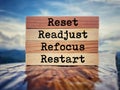 Inspirational and Motivational Concept - reset readjust refocus restart text background. Stock photo. Royalty Free Stock Photo