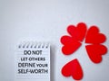 Inspirational and motivational quote of do not let others define your self-worth. Love yourself concept. Stock photo.