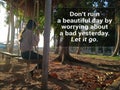 Inspirational motivational quote - Do not ruin a beautiful day worrying about a bad yesterday. Let it go. With young girl on swing Royalty Free Stock Photo