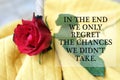 Inspirational motivational quote - In the end we only regret the chances we did not take. Regret concept with red rose flower. Royalty Free Stock Photo