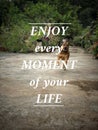 Inspirational motivational quote. Enjoy every moment of your life. Text in vintage background. Royalty Free Stock Photo