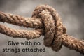 Inspirational motivational quote - Give with no strings attached. With rope background.