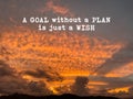 Inspirational and motivational quote of a goal without a plan is just a wish. Sunset background. Stock photo. Royalty Free Stock Photo