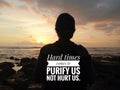 Inspirational motivational quote - Hard times comes to purify us not hurt us. With blurry image of young woman back silhouette, Royalty Free Stock Photo