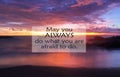 Inspirational motivational quote- May you always do what you are afraid to do. With blurry image of dramatic colorful sky at Royalty Free Stock Photo