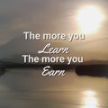 Phrase the more you learn the more you earn with sunset seascape blurry and grain background.