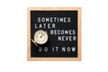 Inspirational motivational quote Sometimes later becomes never. Do it now words on a letter board with vintage alarm clock