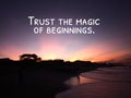 Inspirational motivational quote - Trust the magic of beginnings. With colorful sunrise light glow on the beach. Royalty Free Stock Photo