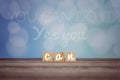 Inspirational motivational quote - You can do it. Yes you can. Self motivation and encouragement concept with wooden blocks.