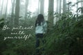 Inspirational motivational words - Be patient with yourself. With young girl walking alone in the misty forest. Royalty Free Stock Photo