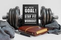 Inspirational new year concept and healthy lifestyle quote. Dumbbell and Notepad.