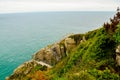 Inspirational path on the cliffs towards the sea. Royalty Free Stock Photo