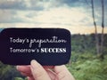 Inspirational Quote concept - todays preparation tomorrows success with blurred nature background. Stock photo.