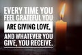 Inspirational quote - Every time you feel grateful you are giving love, and whatever you give, your receive. With a burning candle