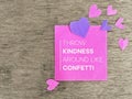 Inspirational Quote Good Vibes Concept - Throw kindness around like confetti text on note paper with hearts background.