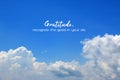 Inspirational quote - Gratitude, recognize the good in your life. On background of bright blue sky and white clouds. Royalty Free Stock Photo