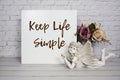 Inspirational quote Keep Life Simple text message written on white wooden board Royalty Free Stock Photo