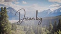 Inspirational quote on a landscape with the text Dream big. Message or card. Concept of inspiration. Positive phrase. Poster, card Royalty Free Stock Photo