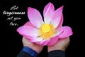 Inspirational quote - Let forgiveness set you free. With woman holding a pink lotus flower blossom in hands on black background.