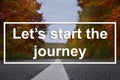Inspirational quote - LetÃ¢â¬â¢s start the journey. Beautiful view of asphalt road going through autumn forest Royalty Free Stock Photo