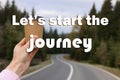 Inspirational quote - LetÃ¢â¬â¢s start the journey. Woman holding takeaway cardboard coffee cup near road outdoors, closeup Royalty Free Stock Photo