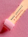 Inspirational Quote. Make yourself a priority text behind torn paper background. Royalty Free Stock Photo