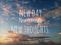 Inspirational quote - New day, new strength, new thoughts. Motivational message written on blurry dramatic colorful sunset sky.