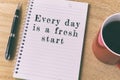 Inspirational quote on notepad - Every day is a fresh start Royalty Free Stock Photo