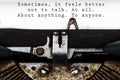 Inspirational quote - Sometimes, it feels better not to talk. At all. About anything. To anyone. Typewriter diary story letter. Royalty Free Stock Photo