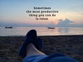 Inspirational quote - Sometimes the most productive thing you can do is relax. With blurry legs of a young woman sitting alone on