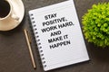Flat lay of Notebook with Inspirational quote -Stay positive, work hard and make it happen