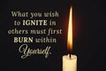 Inspirational quote text - What you wish to ignite in others must first burn within yourself. With candle on dark Royalty Free Stock Photo