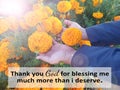 Inspirational quote - Thank you God for blessing me much more than i deserve. With warm light shine over marigold flowers.