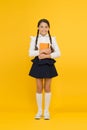 Inspirational quotes motivate kids for academic year ahead. School girl formal uniform hold book. School lesson. Study