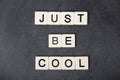 Inspirational sentence formed with game tiles Just be Cool