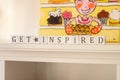 Inspirational Sign saying get inspired. Royalty Free Stock Photo