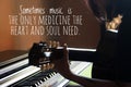 Inspirational words - Sometimes music is the only medicine the heart and soul need. With silhouette of young woman playing guitar Royalty Free Stock Photo