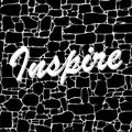 Inspire lettering icon or logo on dark background