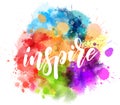 Inspire handwritten message on watercolor splash