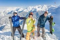 Inspired group of snowboarders at summit